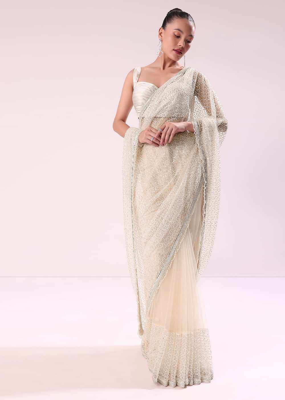 Off White Fancy Sequence Net Saree With Pleated Stitched