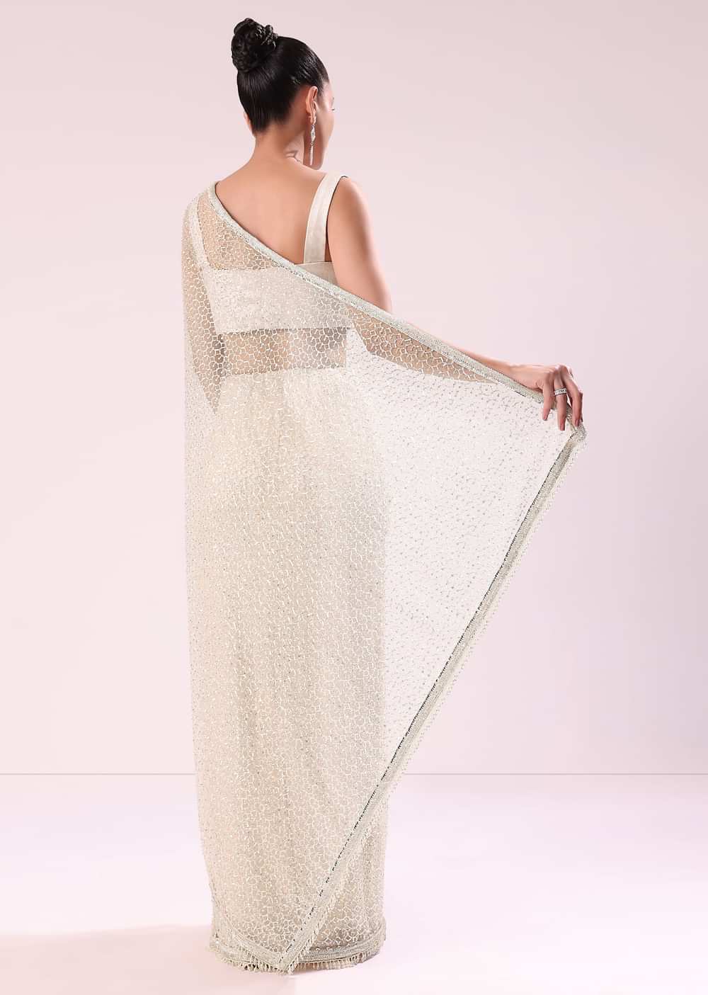 Off White Fancy Sequence Net Saree With Pleated Stitched