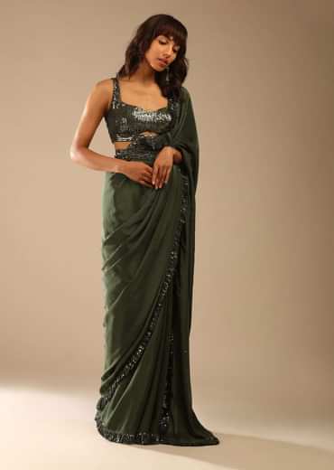 Olive Green Saree In Crepe With Sequins Ruffle On The Border, Sequins Blouse With Front Cut Out And Embellished Belt