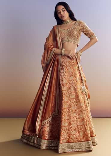 Orange Banarasi Lehenga With Embroidered Choli And Dupatta