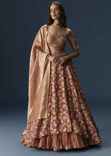 Orange Embroidered Blouse With Ruching Lehenga And Tassel Dupatta