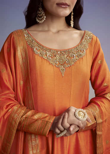 Orange Silk Anarkali Suit With Heavy Embroidery And Weave Border