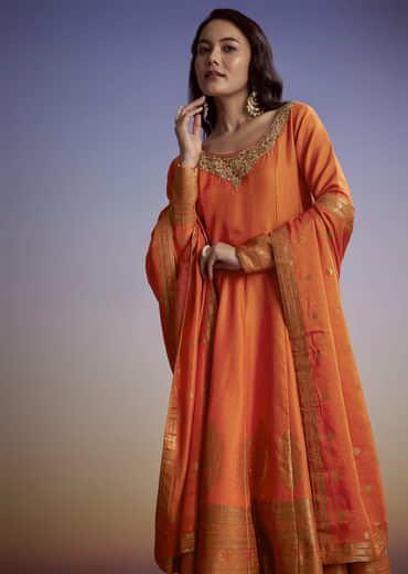 Orange Silk Anarkali Suit With Heavy Embroidery And Weave Border