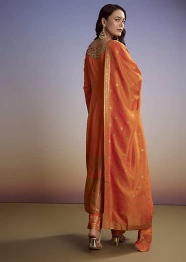 Orange Silk Anarkali Suit With Heavy Embroidery And Weave Border