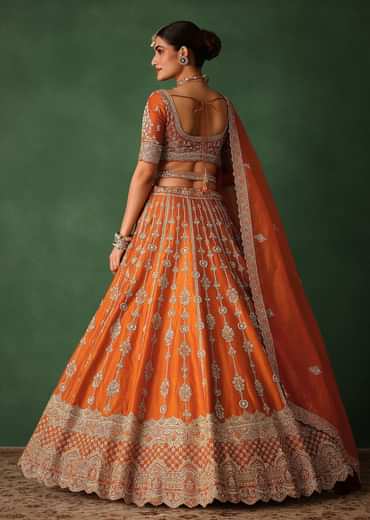 Orange Lehenga Set In Raw Silk With Hand Embroidered Motifs