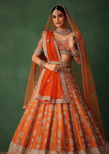 Orange Lehenga Set In Raw Silk With Hand Embroidered Motifs