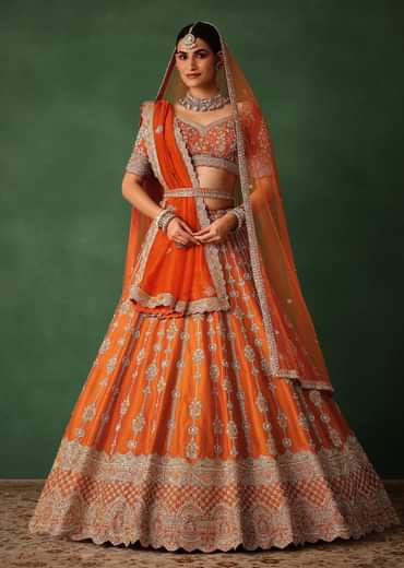 Orange Lehenga Set In Raw Silk With Hand Embroidered Motifs