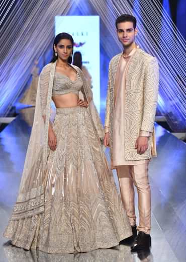Oyster Organza Lehenga With Cut Dana Embroidery, Crop Top Comes In 3/4Th Sleeves With A Deep V Neckline