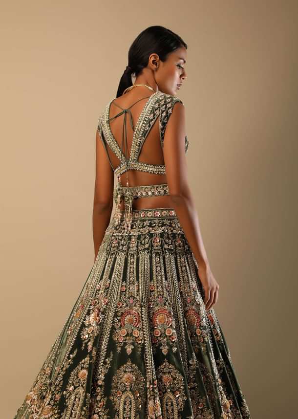 Palace Green Lehenga Choli In Velvet With Multi Colored Hand Embroidered Heritage Kalis With Hints Of Flowers