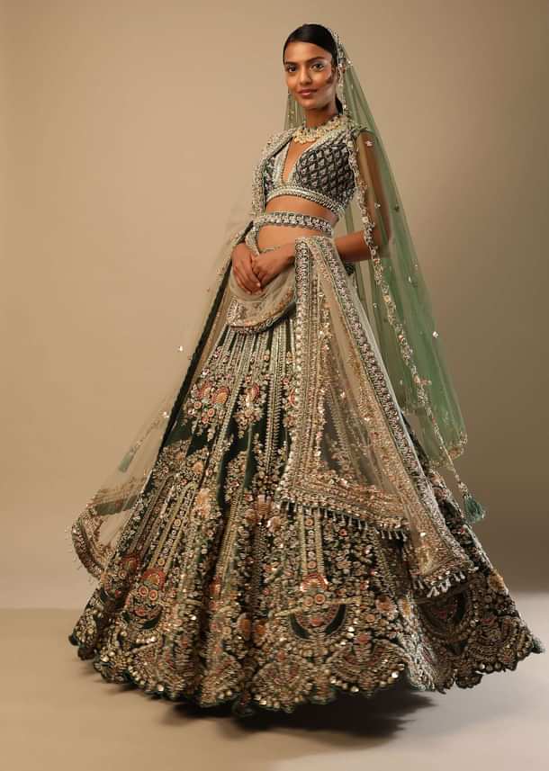Palace Green Lehenga Choli In Velvet With Multi Colored Hand Embroidered Heritage Kalis With Hints Of Flowers