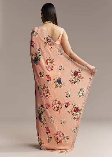 Peach Crepe Saree With Multicolor Floral Print And Embroidered Border