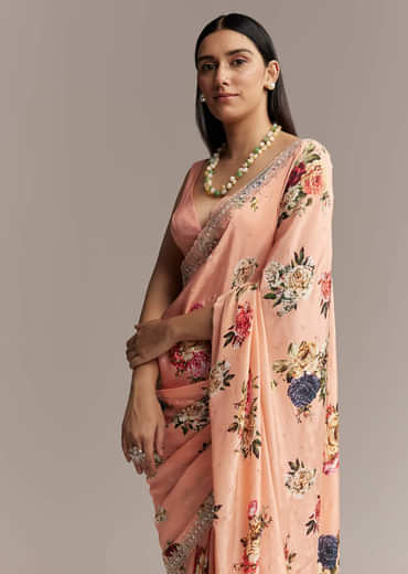 Peach Crepe Saree With Multicolor Floral Print And Embroidered Border