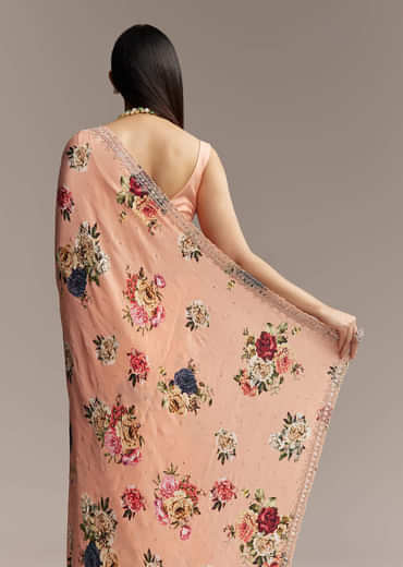 Peach Crepe Saree With Multicolor Floral Print And Embroidered Border