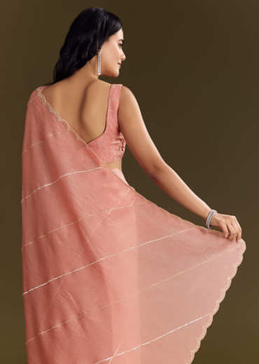 Peach Crush Tissue Saree With Cutdana And Beads Scallop Border