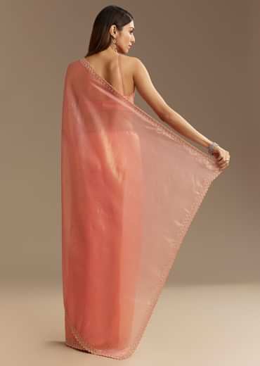 Peach Tissue Saree With Stones Cutdana Embellishments And Scallop Border
