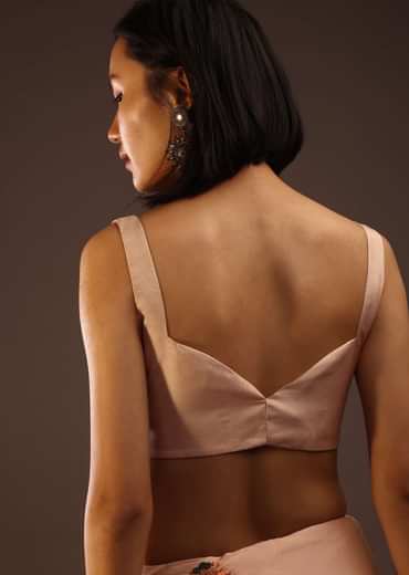 Peach Blush Sleeveless Blouse In A Sweetheart Neckline Back Hook Closure With A Straight Hemline