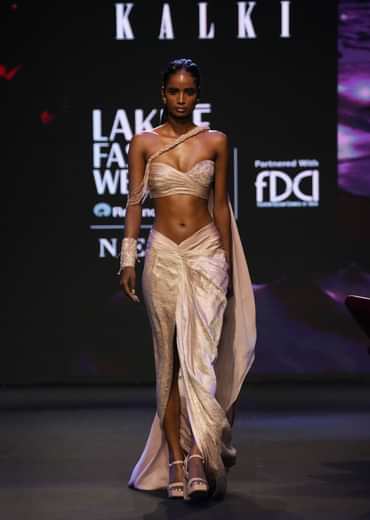 Peach Brocade Draped Skirt With Pleated One Shoulder Blouse