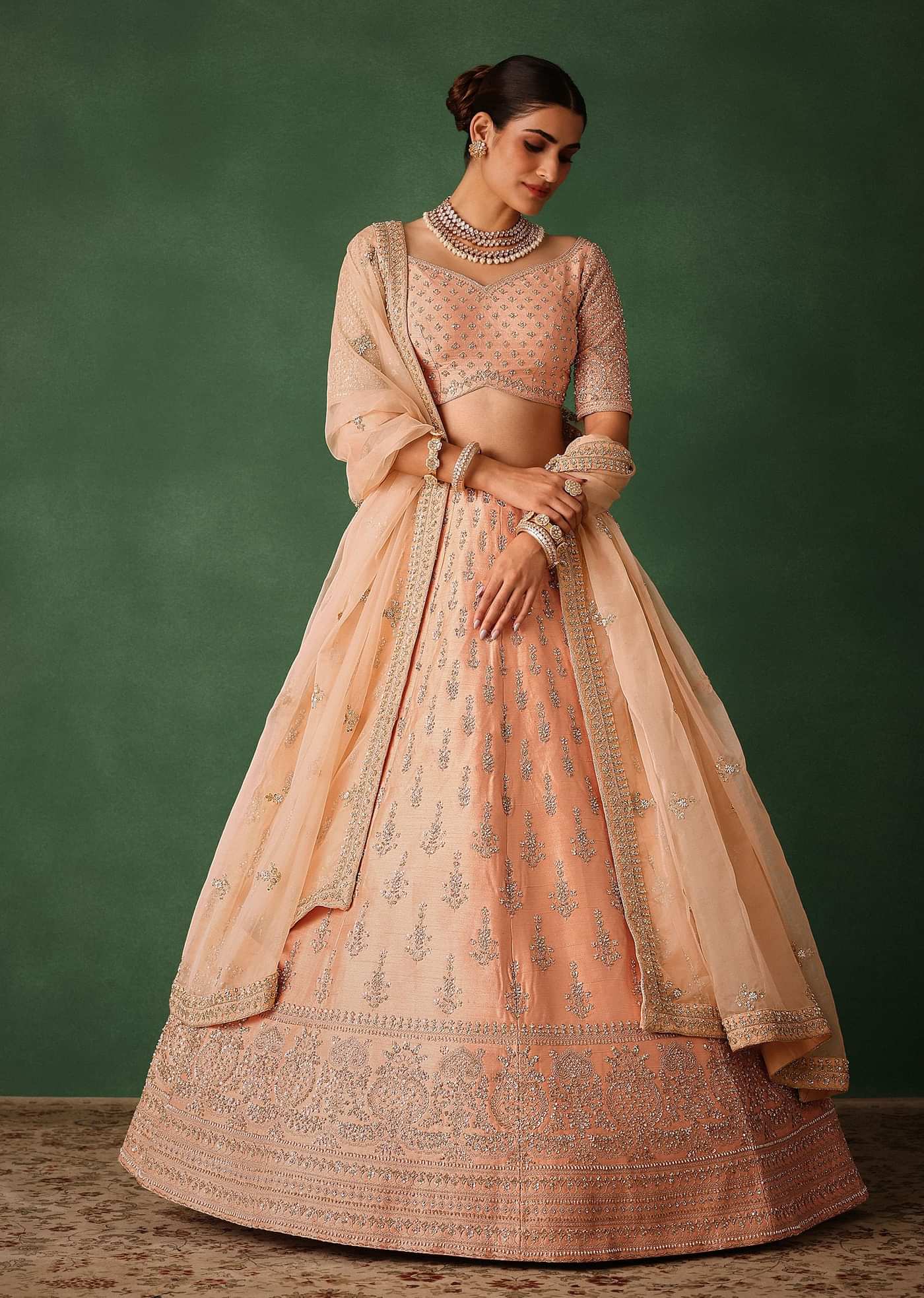 Peach Hand Embroidered Raw Silk Lehenga Set With Butti Work