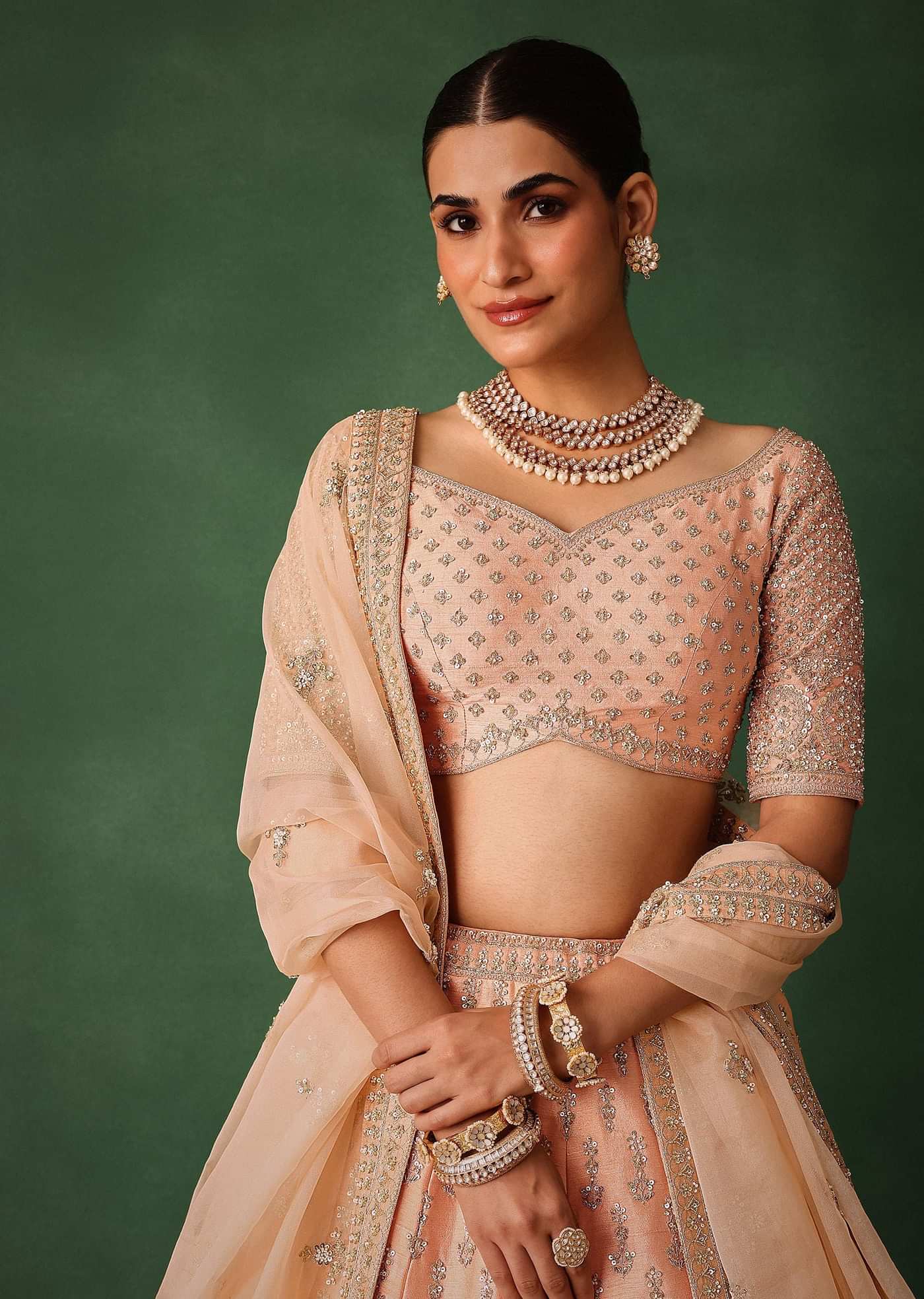 Peach Hand Embroidered Raw Silk Lehenga Set With Butti Work