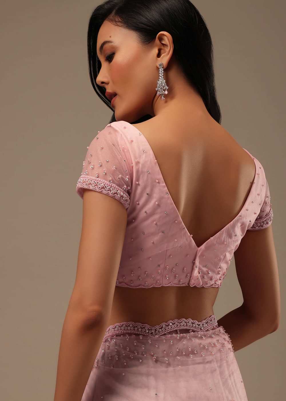 Peach Pink Stone And Beads Embellished Net Saree