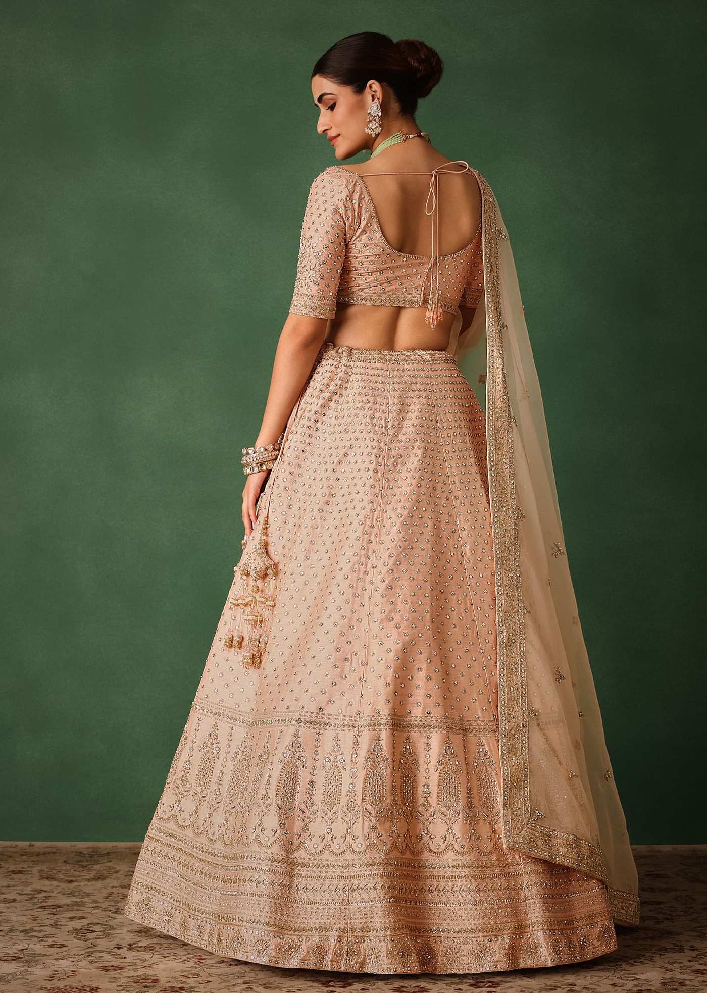 Peach Raw Silk Lehenga Set With Hand Embroidery