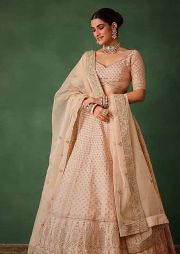 Peach Raw Silk Lehenga Set With Hand Embroidery