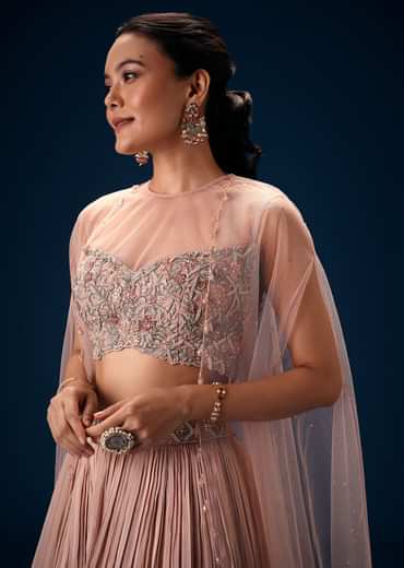 Peach Ruched Lehenga With Embroidered Blouse and Net Cape