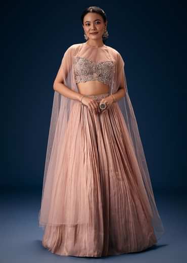 Peach Ruched Lehenga With Embroidered Blouse and Net Cape