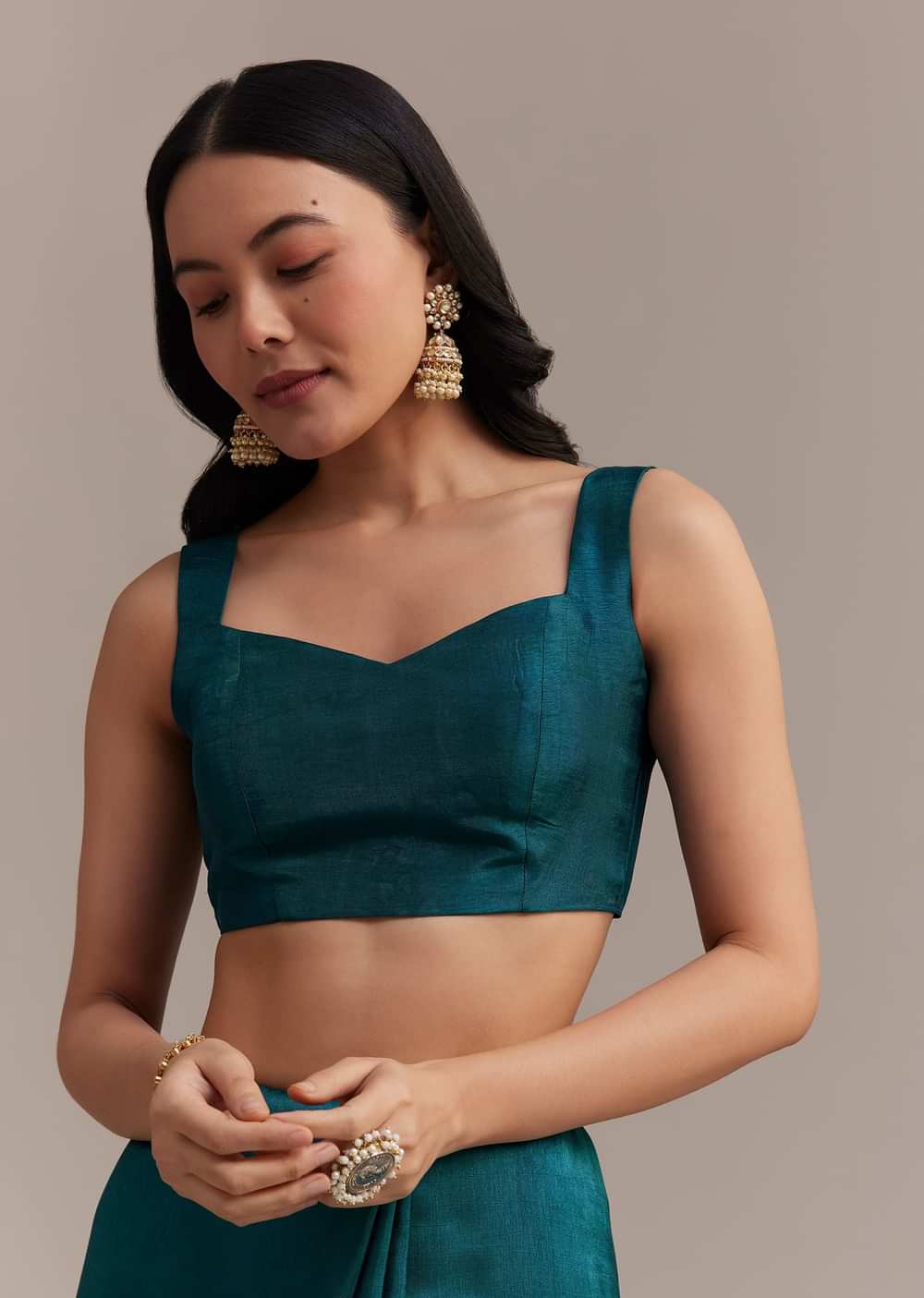 Peacock Blue Dola Silk Saree With All Over Zari Weaving