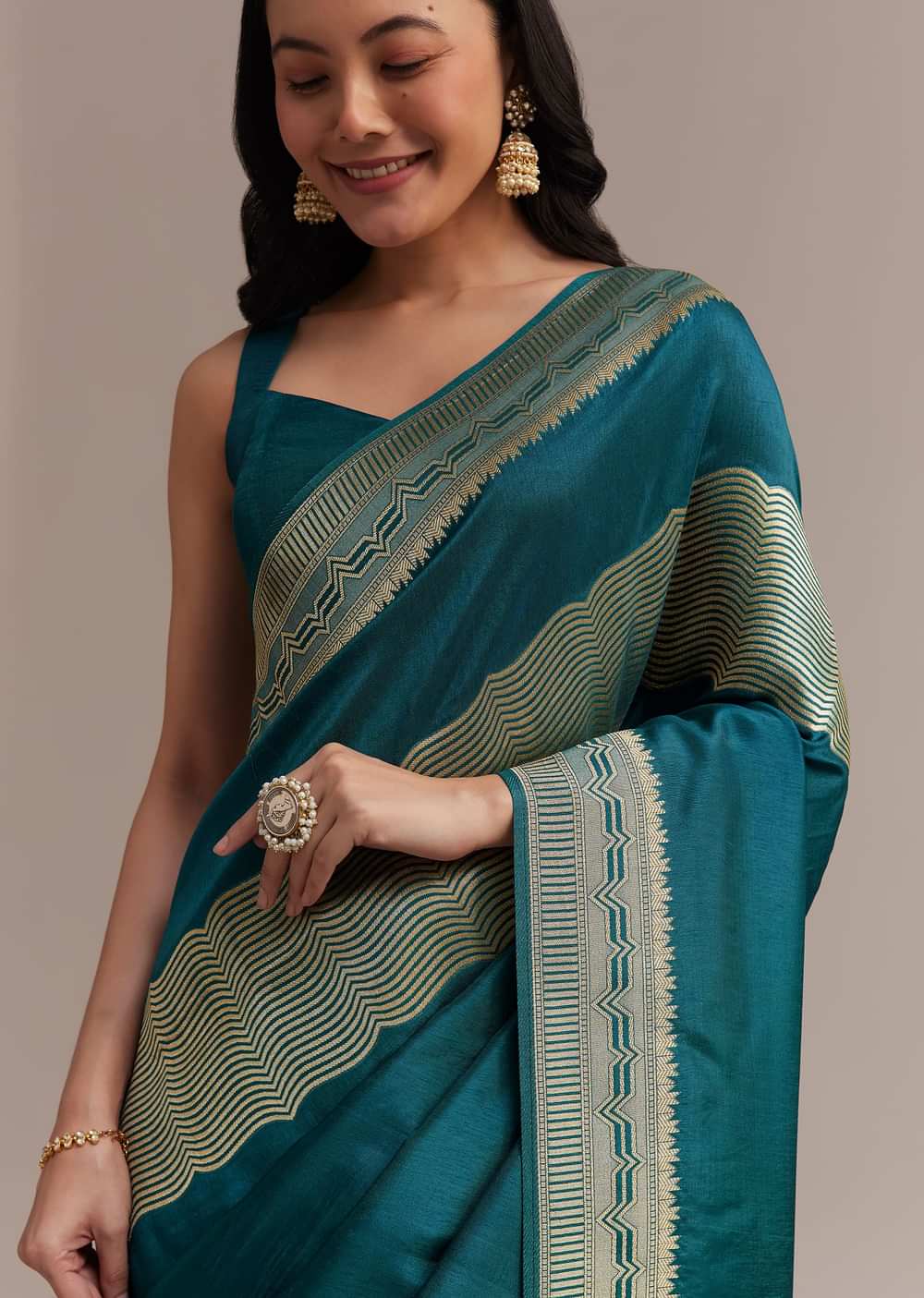 Peacock Blue Dola Silk Saree With All Over Zari Weaving