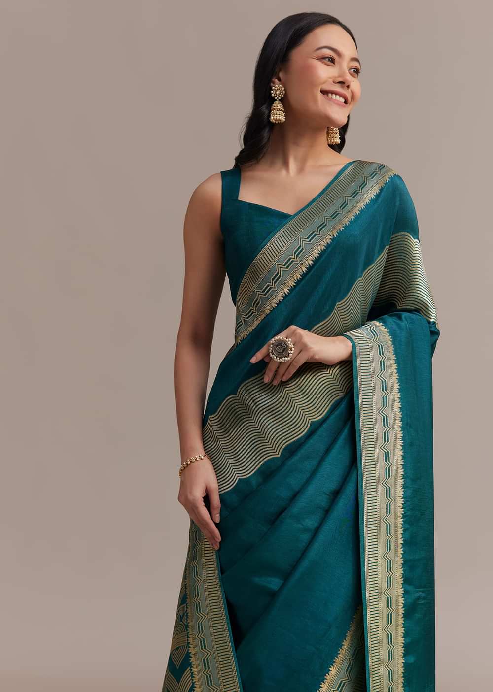 Peacock Blue Dola Silk Saree With All Over Zari Weaving