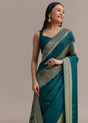 Peacock Blue Dola Silk Saree With All Over Zari Weaving