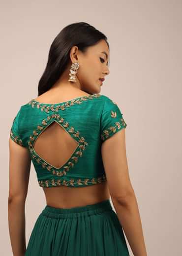 Peacock Green Blouse In Raw Silk With Zardosi Embroidery And A Diamond Cut Out On The Back