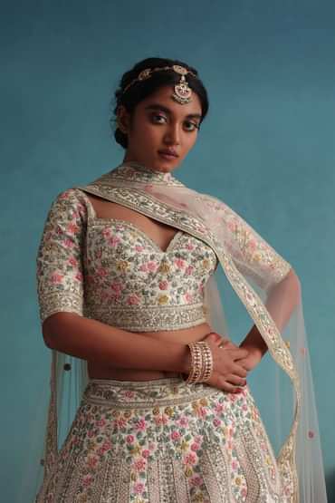 Pearl White Embroidered 12 Kali Bridal Lehenga In Raw Silk With Hand Embroidery