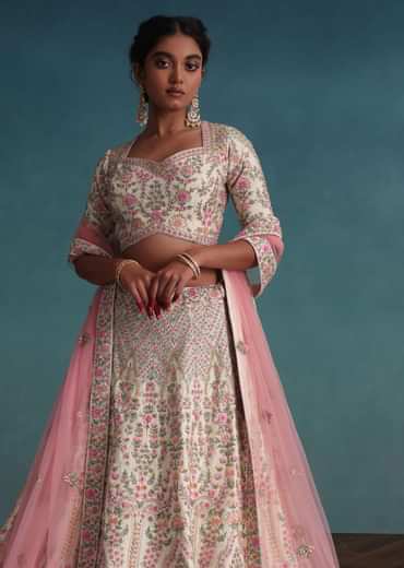 Pearl White Embroidered Bridal Lehenga In Raw Silk With Floral Hand Embroidery