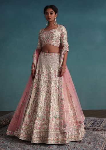 Pearl White Embroidered Bridal Lehenga In Raw Silk With Floral Hand Embroidery