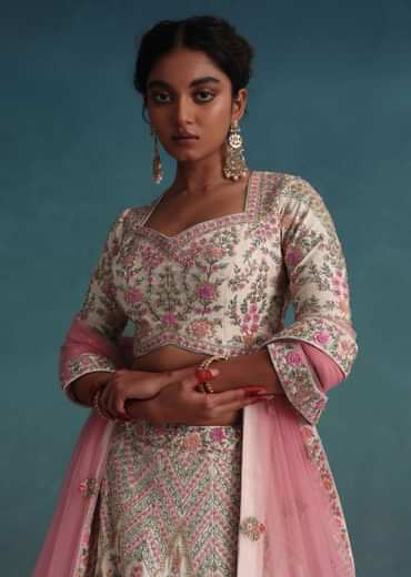 Pearl White Embroidered Bridal Lehenga In Raw Silk With Floral Hand Embroidery