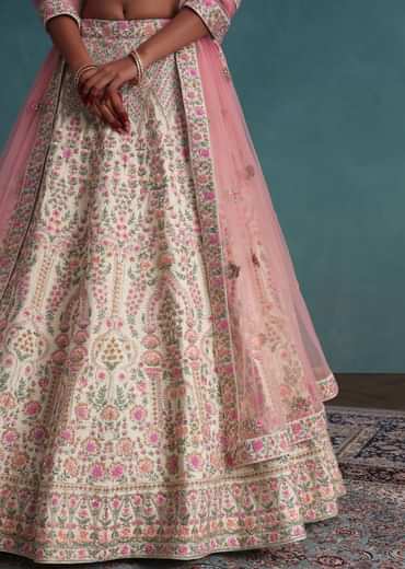 Pearl White Embroidered Bridal Lehenga In Raw Silk With Floral Hand Embroidery