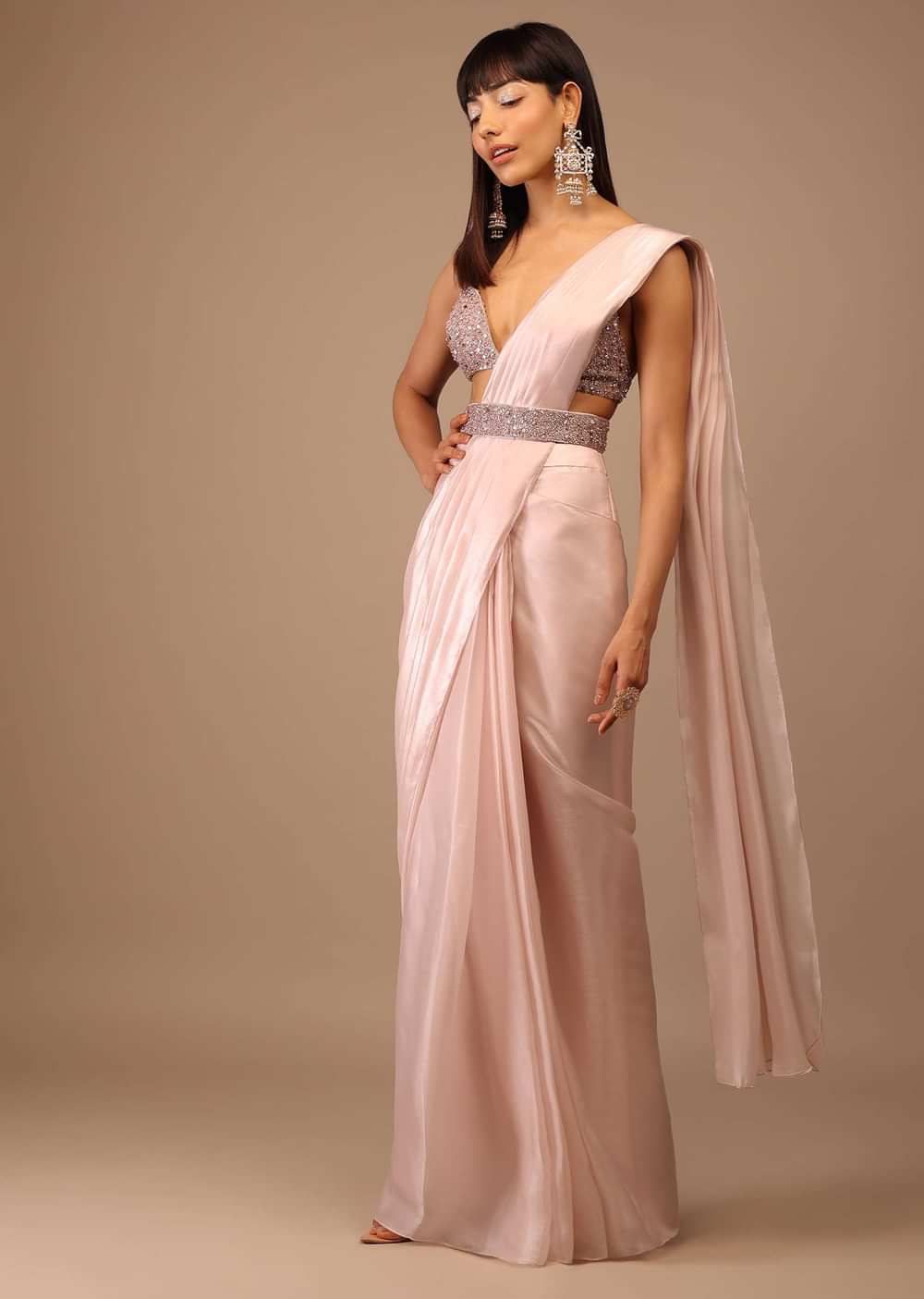 Candy Pink Organza Saree With A Heavily Embroidered Bustier And Belt