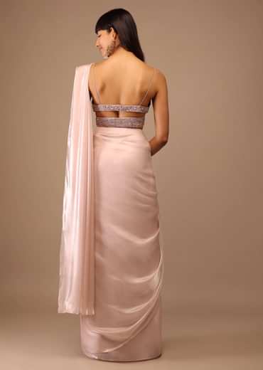 Candy Pink Organza Saree With A Heavily Embroidered Bustier And Belt