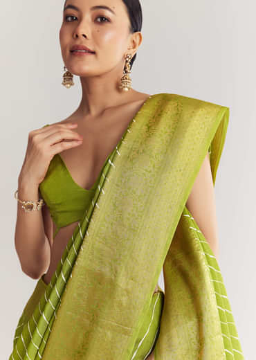 Pista Green Saree With Lehariya Print And Floral Gotapatti And Moti Work.
