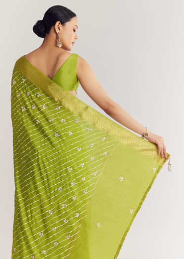 Pista Green Saree With Lehariya Print And Floral Gotapatti And Moti Work.