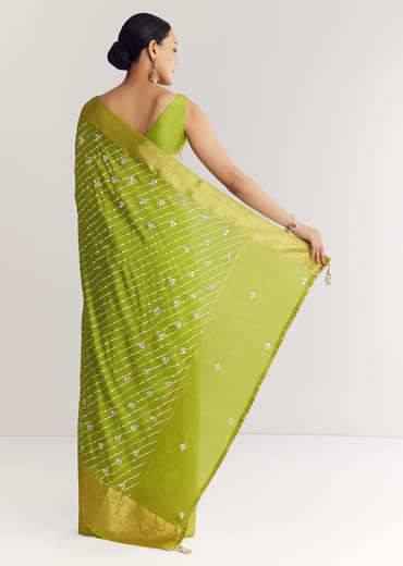 Pista Green Saree With Lehariya Print And Floral Gotapatti And Moti Work.