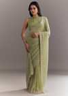 Pista Green Tissue Saree With Leaf Motif Embroidery In Sequins And Cutdana