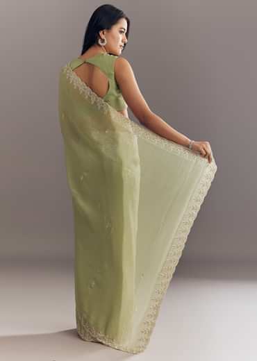 Pista Green Tissue Saree With Leaf Motif Embroidery In Sequins And Cutdana