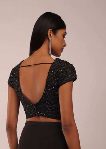 Pitch Black Saree With Three Tones Of Layered Frills On The Bottom Embellished In Stones And Sequins With A Tassel On The Pallu Corner