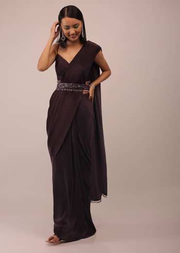 Plum Saree With Moti And Cut Dana Fringes Detailing On The Pallu And A Spaghetti Straps Crop Top With An Embroidered Belt In Fringes