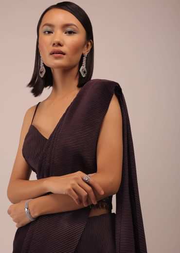 Plum Saree With Moti And Cut Dana Fringes Detailing On The Pallu And A Spaghetti Straps Crop Top With An Embroidered Belt In Fringes