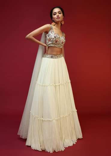 Powder White Lehenga Choli With Attached Cape And Hand Embroidery Using Colorful Resham And Sequins In Floral Motifs