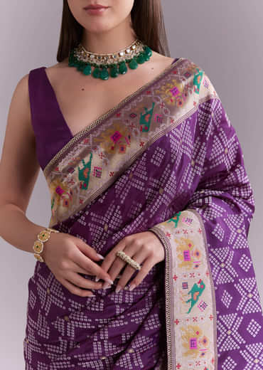 Purple Silk Saree With Zari Border And Multicolour Motifs
